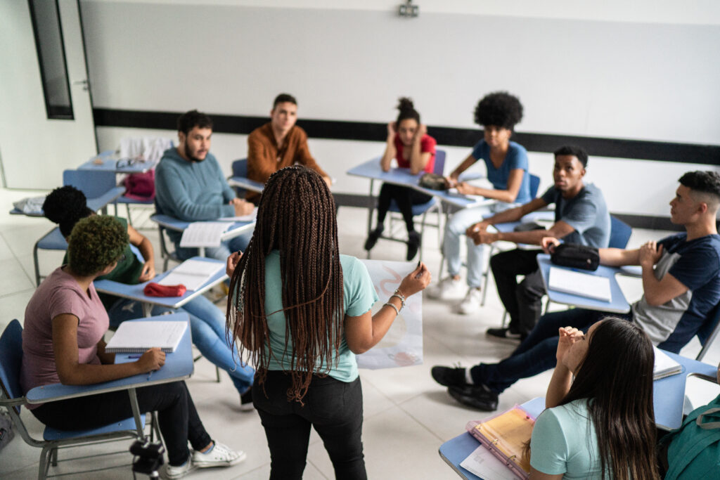 Teenage student doing a presentation in the classroom