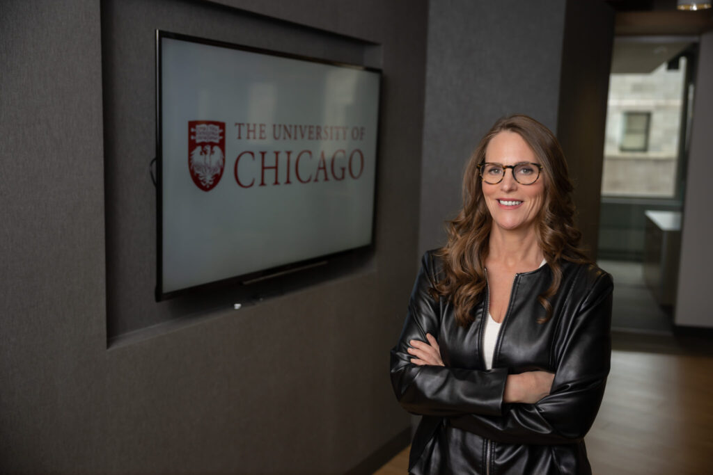 Photo of Founding Executive Director Roseanna Ander standing at the Education Lab office